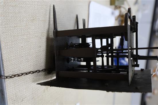 An early 18th century brass and wrought iron birdcage dial wall clock, dial 9in., overall height 12in.